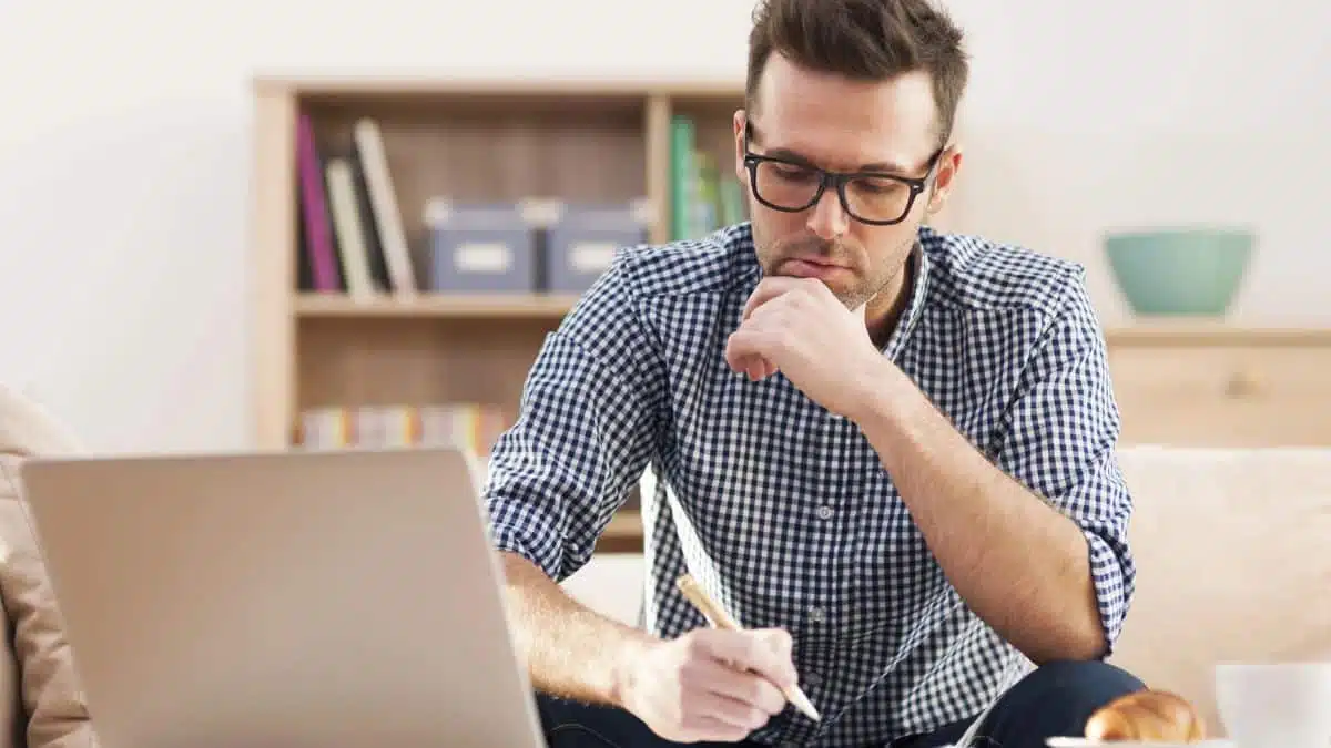 man-working-on-a-computer-glasses