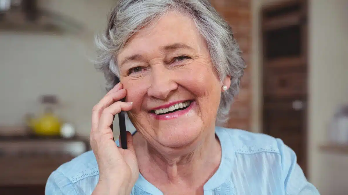 senior woman outside talking on the phone